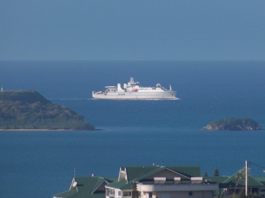 Cable paying out over the stern chute during a lay operation